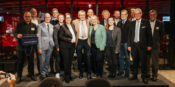 The authors and Prof. Dr. Kleiber at the presentation of the commemorative publication at the 30th Freiburg Real Estate Days